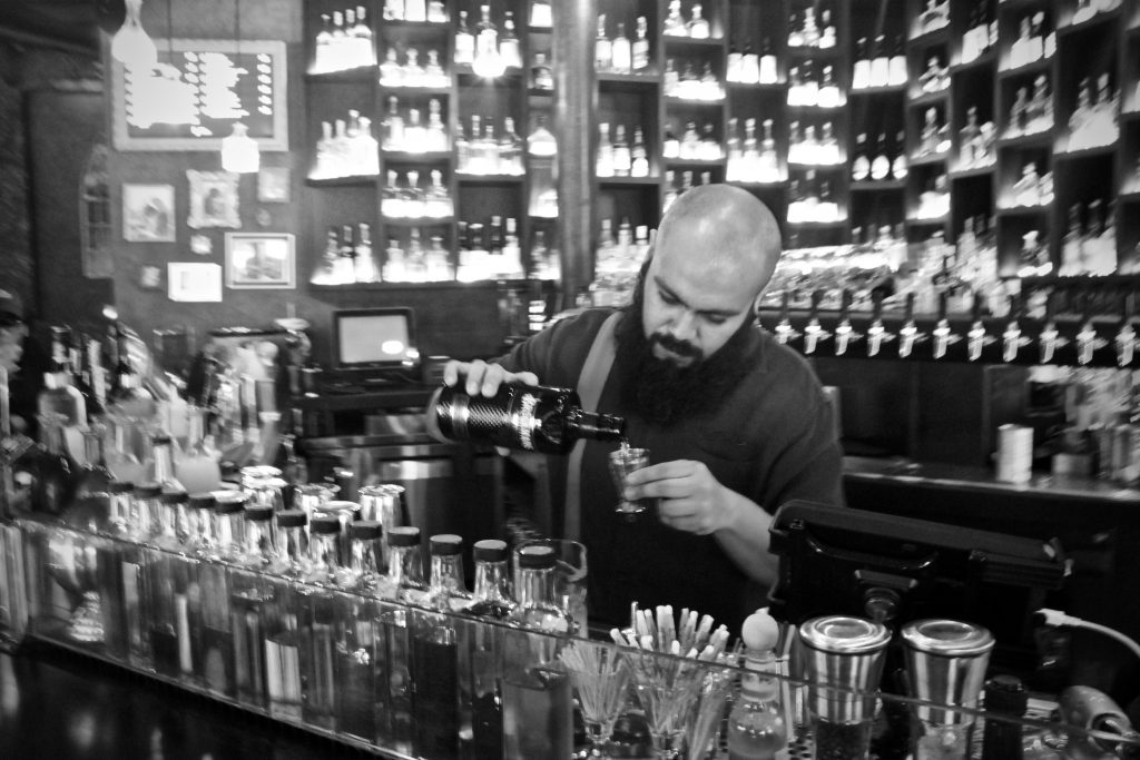 Antonio Molinero makes his Brockmans cocktail, the "Frozen Lake" at Kill Devil in Williamsburg, Brooklyn