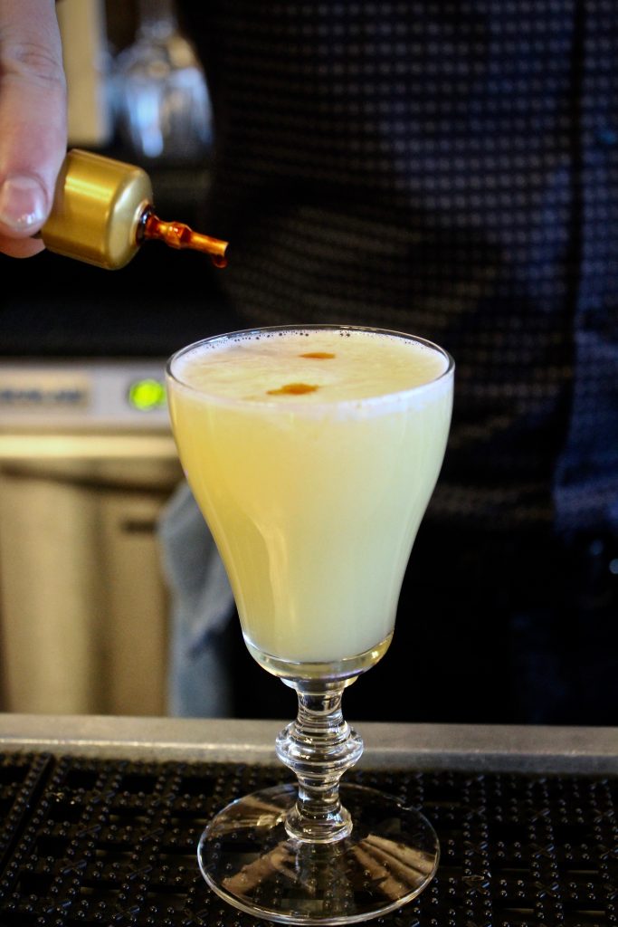 Ian Swindlehurst makes his Brocktail, the Dutch Club, at Explorateur in Boston.