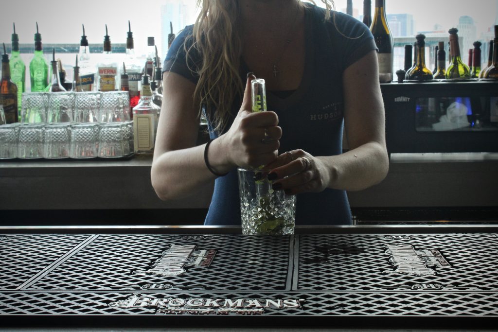 Jessica Wlazlowski makes the "Cucumber Bliss" at Hudson & Co in Jersey City, New Jersey.