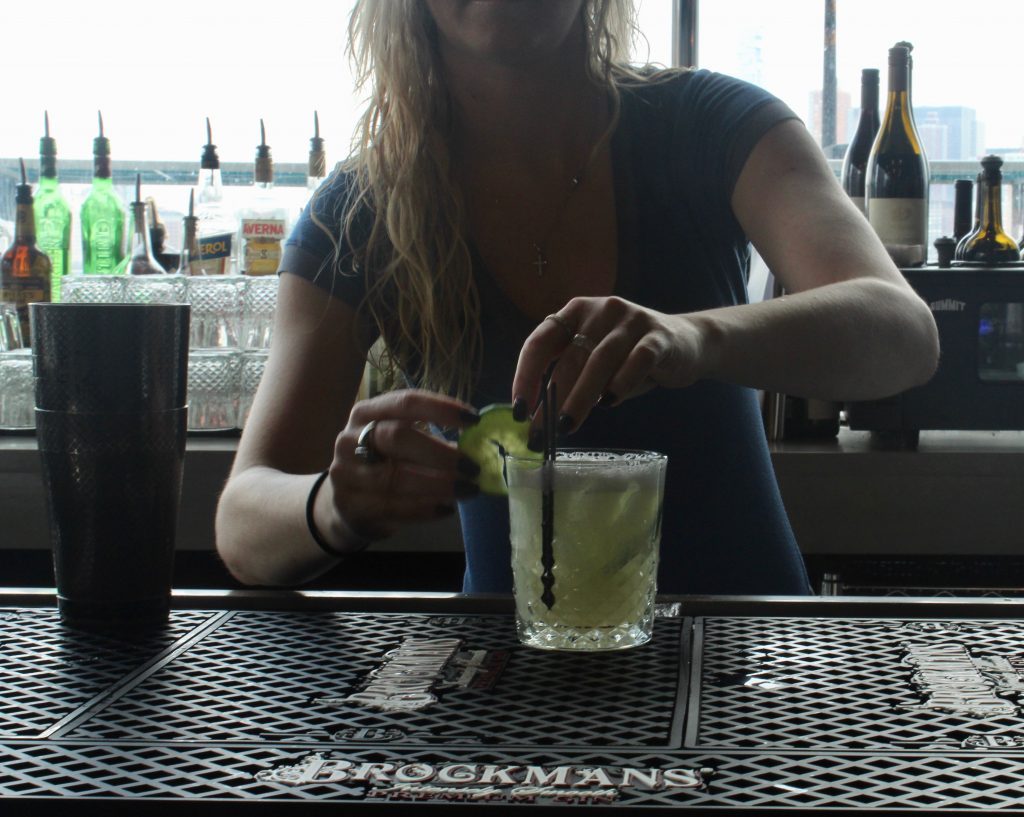 Jessica Wlazlowski makes the "Cucumber Bliss" at Hudson & Co in Jersey City, New Jersey.