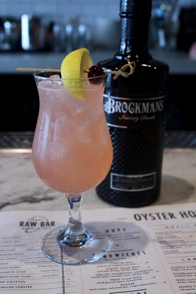 Colin Shearns makes his Brockmans cocktail, the Beach House, at the Oyster House in Philadelphia