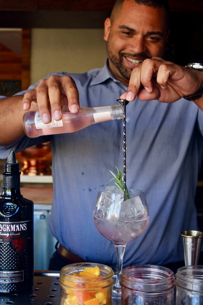 Joel Mesa makes a "Stay Classy," the Brockmans and tonic at Bulla Gastropub in Miami, Florida.