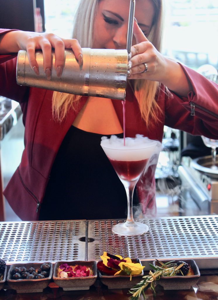 Lora Nefiodchina does r&d for an unnamed Brockmans cocktail at MO Bar in Miami