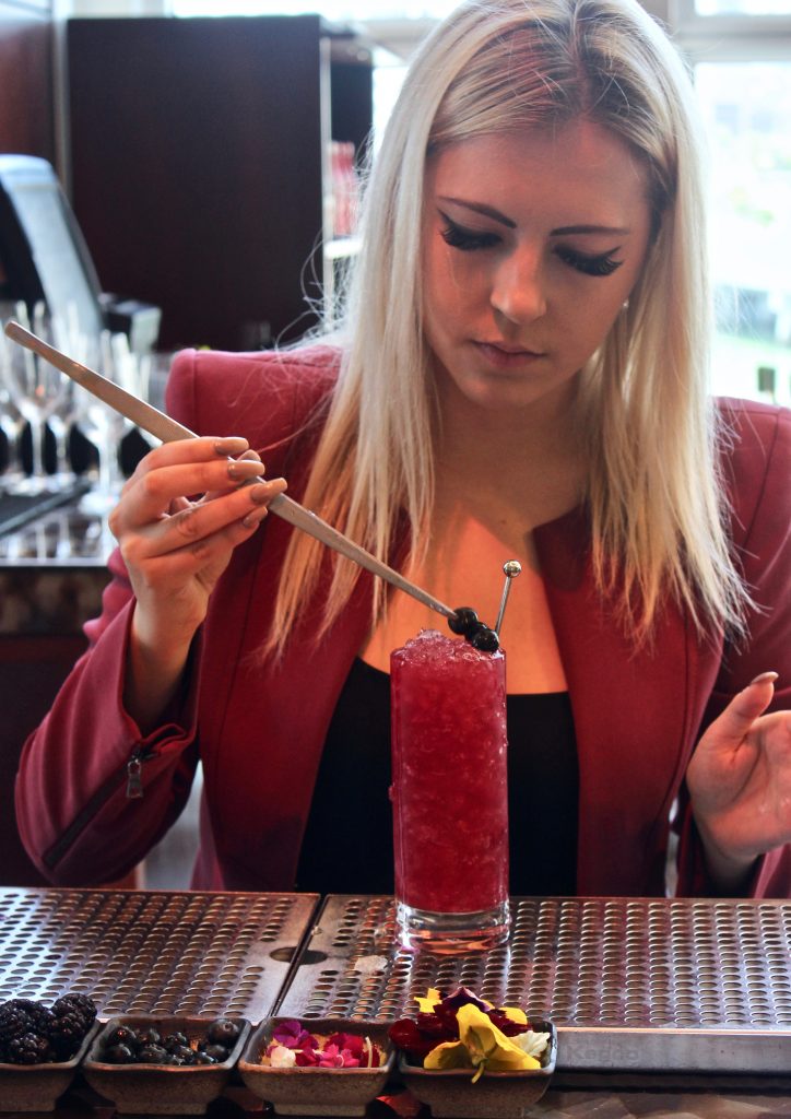 Lora Nefiodchina makes her Brockmans cocktail, Spring into Spring, at MO Bar in Miami