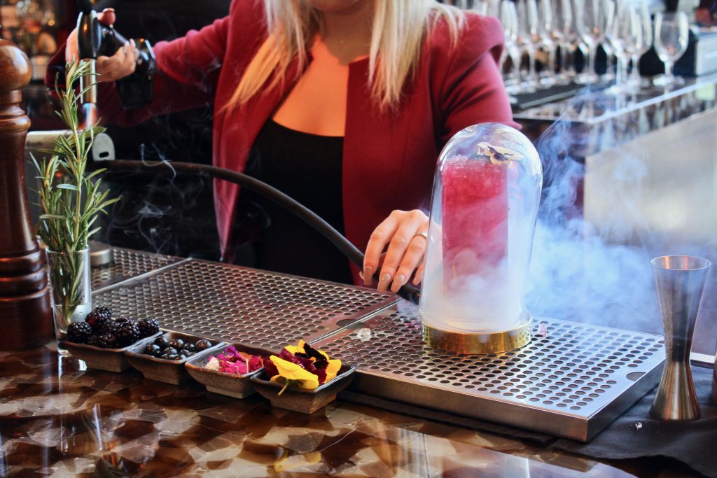 Lora Nefiodchina makes her Brockmans cocktail, Spring into Spring, at MO Bar in Miami