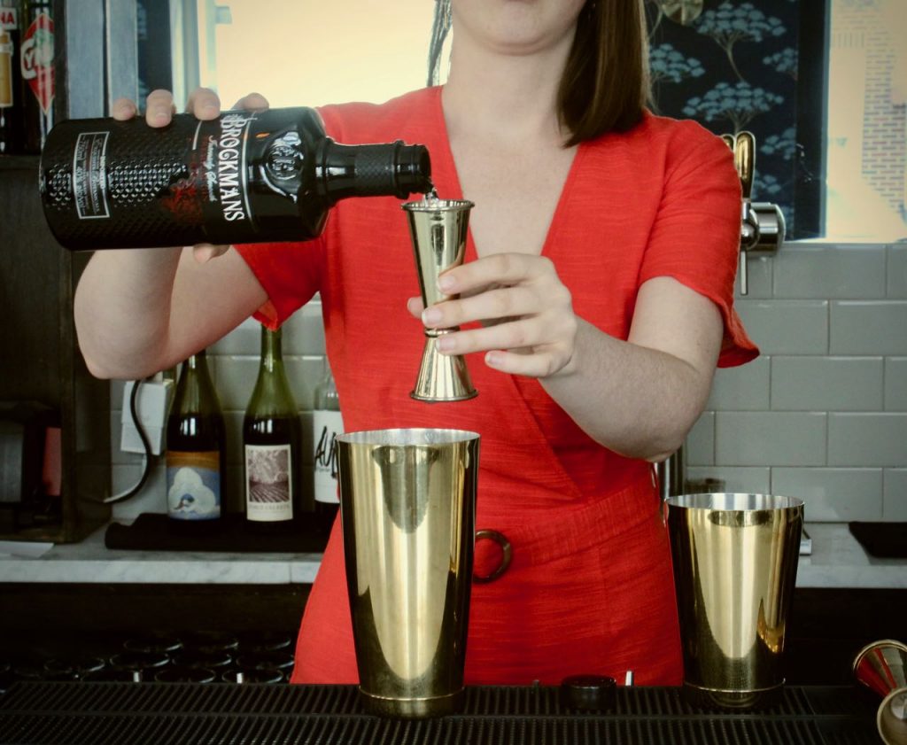 Amber Smith makes Maureen Shannon's Brockmans cocktail, the BFF 75 at Fishtown Social in Philadelphia