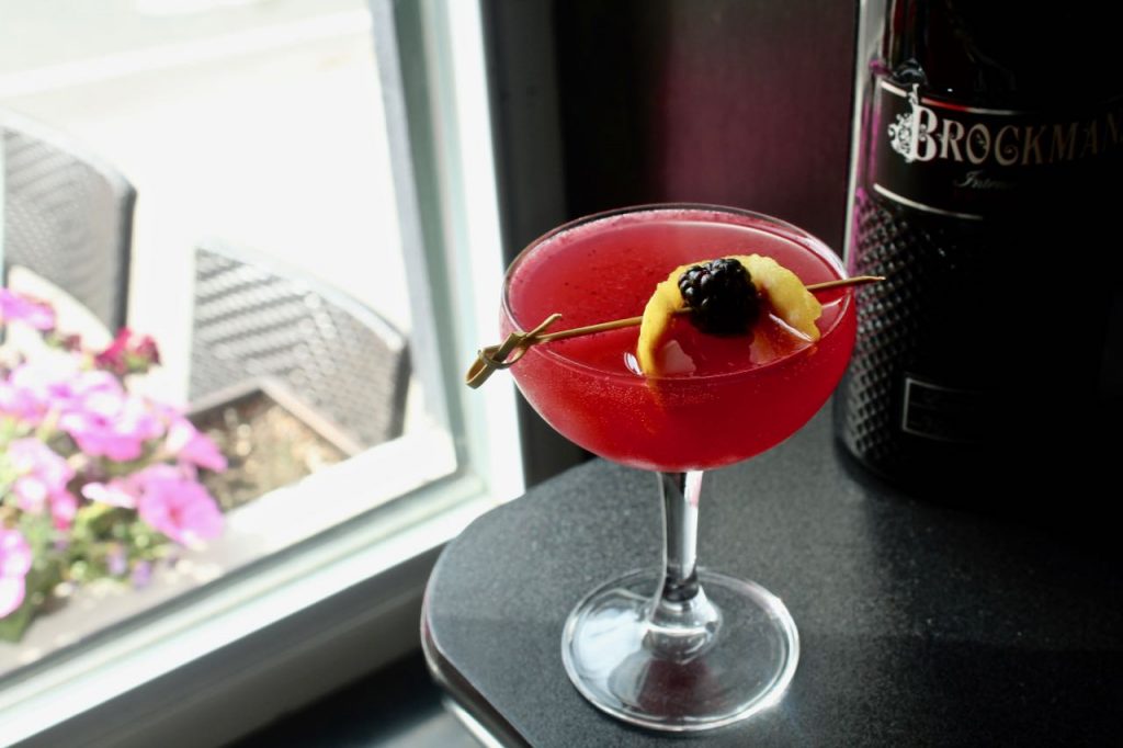 Amber Smith makes Maureen Shannon's Brockmans cocktail, the BFF 75 at Fishtown Social in Philadelphia