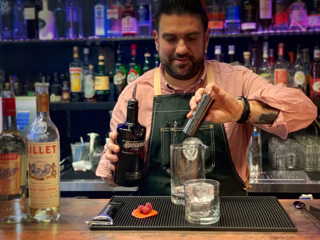 Dimitri Zahariadis makes his Brockmans White Negroni at Highland Brass Co in Waterbury, Connecticut