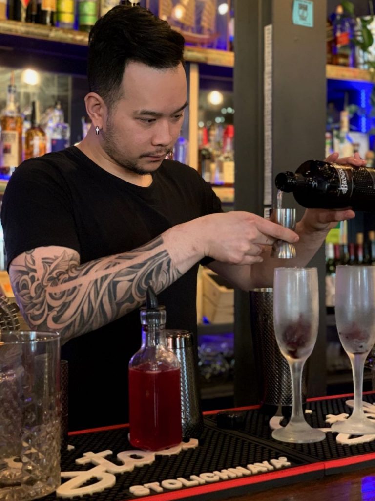 Bobby Chompupang makes his Brockmans cocktail, the Siam Orchid, at Bangkok Bistro in Burlington, Vermont