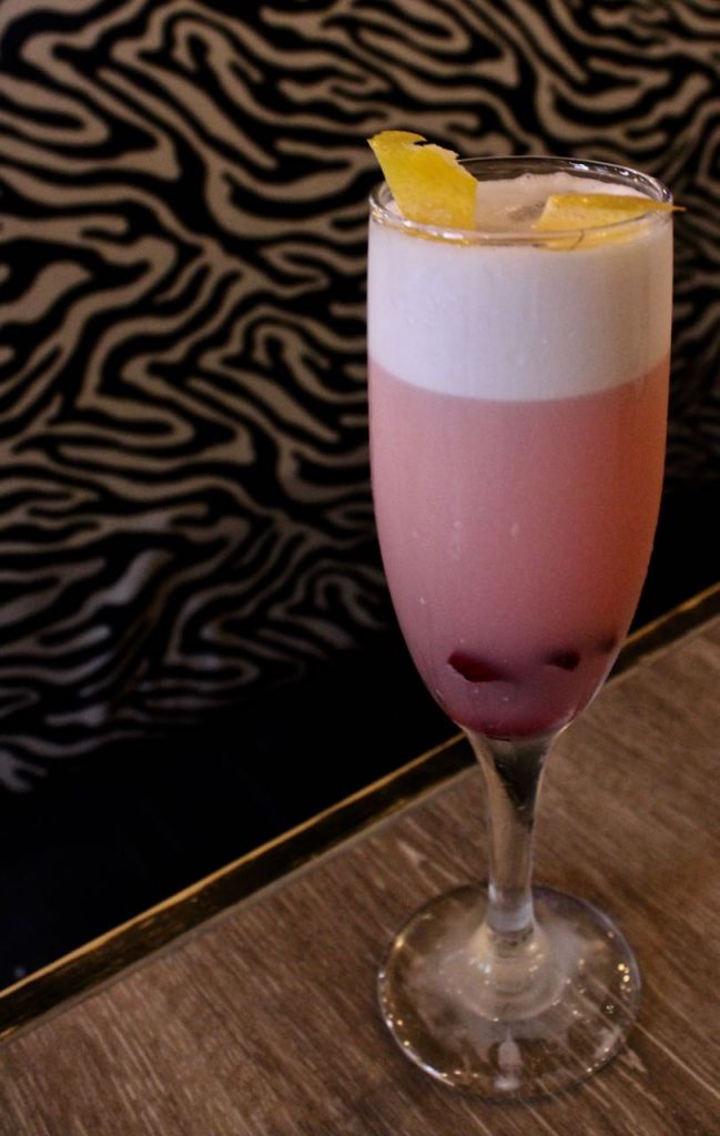 Bobby Chompupang makes his Brockmans cocktail, the Siam Orchid, at Bangkok Bistro in Burlington, Vermont