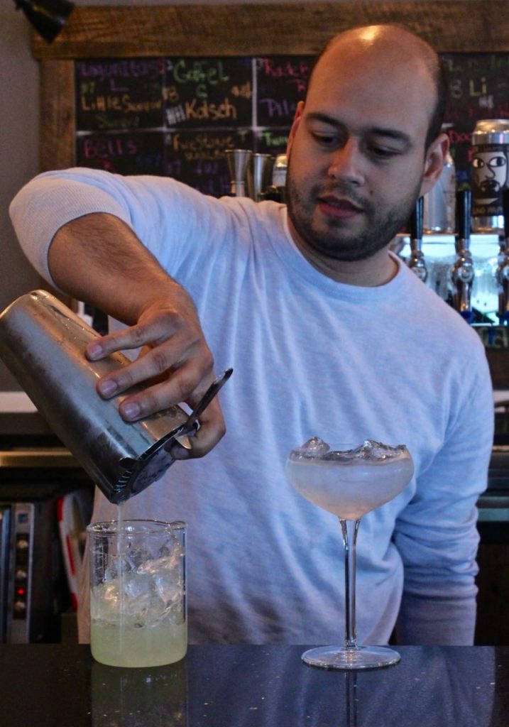 Roger Bencosme makes his Brockmans cocktail, Hemingway's Cure, at Brewology in Speonk, Long Island