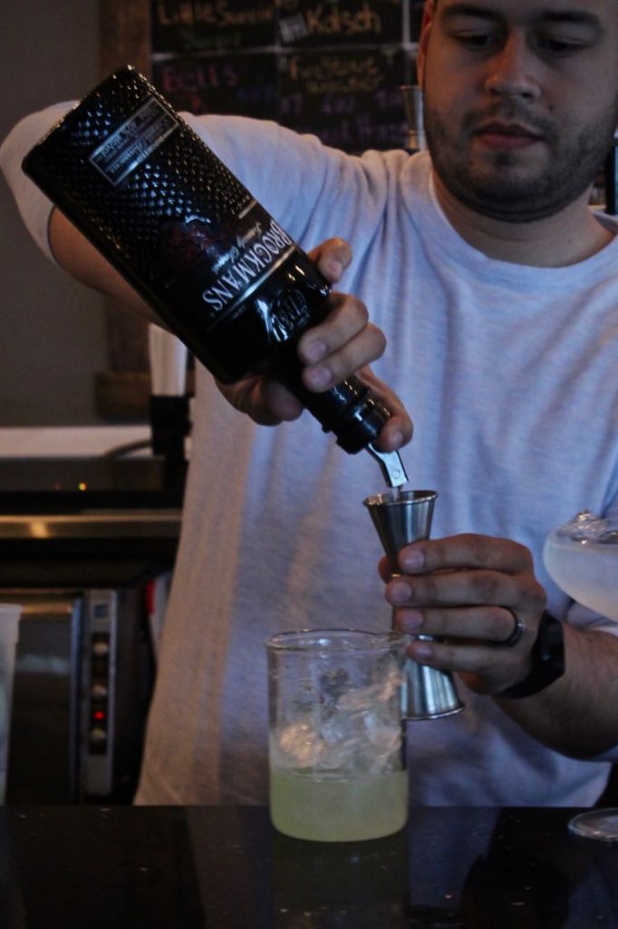 Roger Bencosme makes his Brockmans cocktail, Hemingway's Cure, at Brewology in Speonk, Long Island