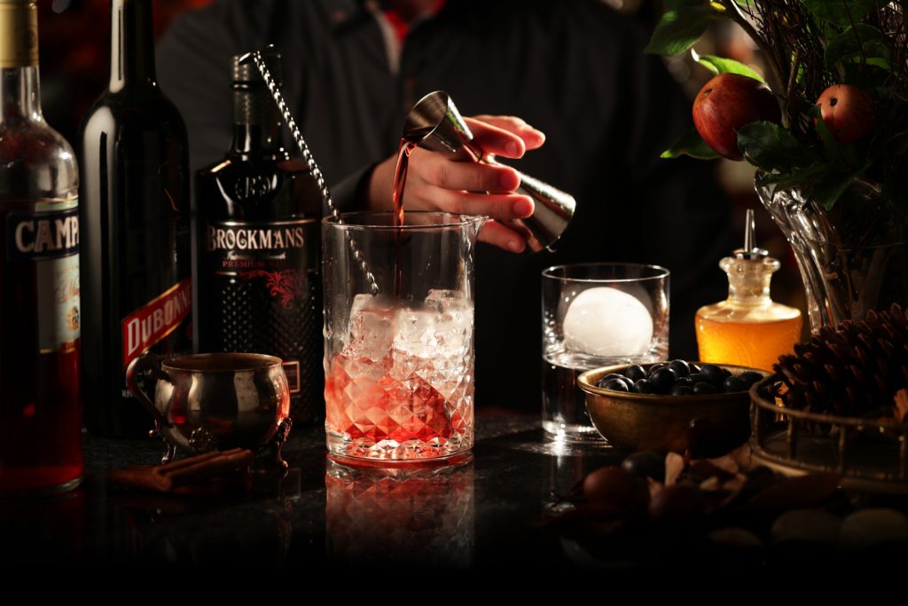 Making a classic Brockmans Gin Negroni