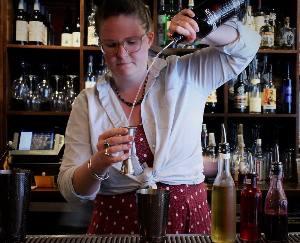 Emily Morton makes her Brockmans Cocktail, Mr. Willard's Mistress, at Deli/126 in Burlington, Vermont