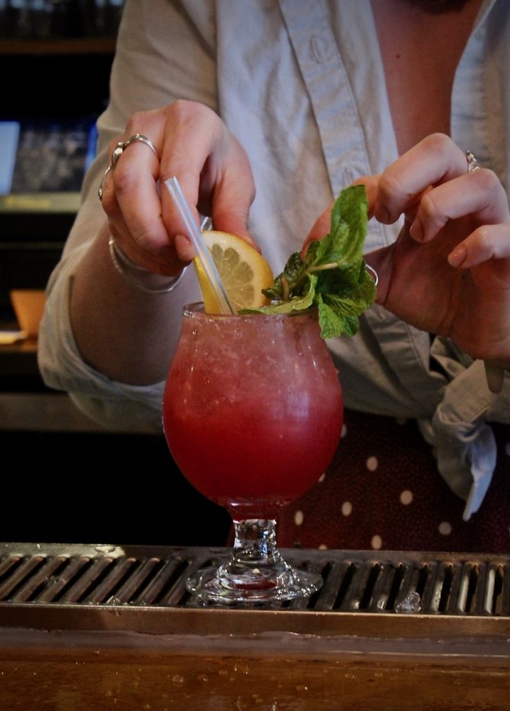 Emily Morton makes her Brockmans Cocktail, Mr. Willard's Mistress, at Deli/126 in Burlington, Vermont