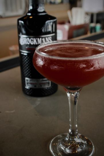 Baileigh Wilson makes her Brockmans cocktail, "You Had Me at Merlet", at The High Note in Atlanta, Georgia