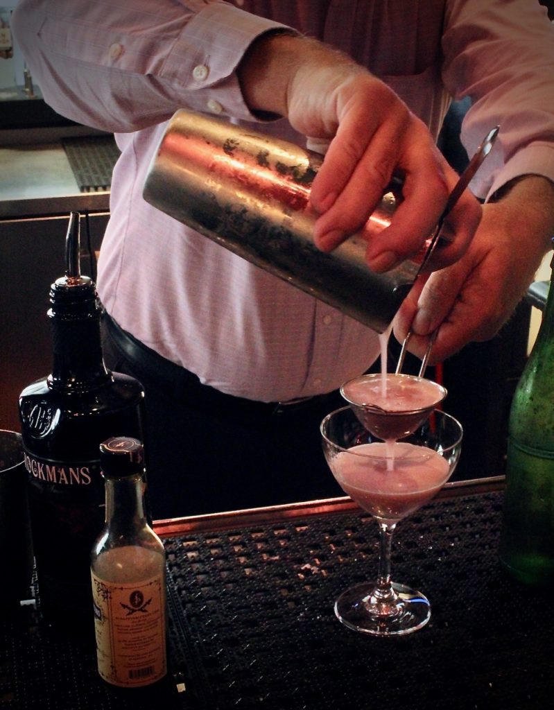 Rick Blumberg makes his Brockmans cocktail, the "Rambling Rose", at Marlow's Tavern in Atlanta, Georgia.