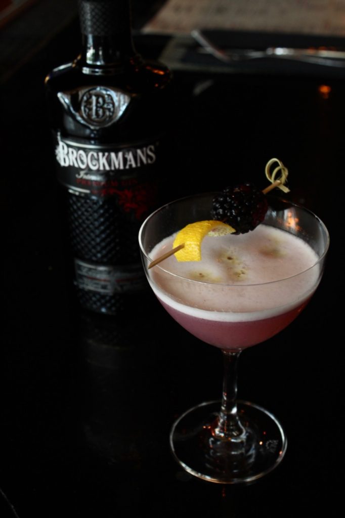 Rick Blumberg makes his Brockmans cocktail, the "Rambling Rose", at Marlow's Tavern in Atlanta, Georgia.