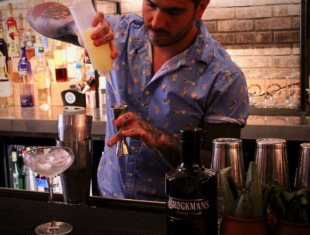 Vinny Iovino makes his Brockmans cocktail, "Nothing but a 'Gin-Thang'", at Mission Taco in Huntington, New York.