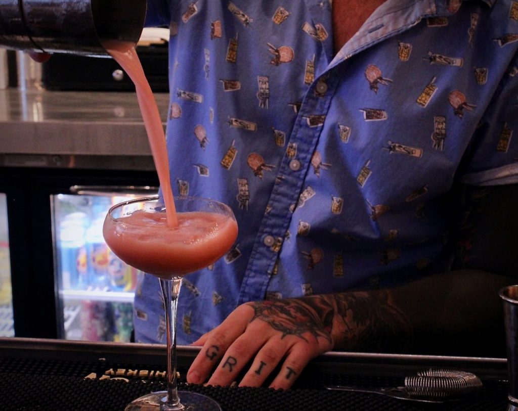 Vinny Iovino makes his Brockmans cocktail, "Nothing but a 'Gin-Thang'", at Mission Taco in Huntington, New York.